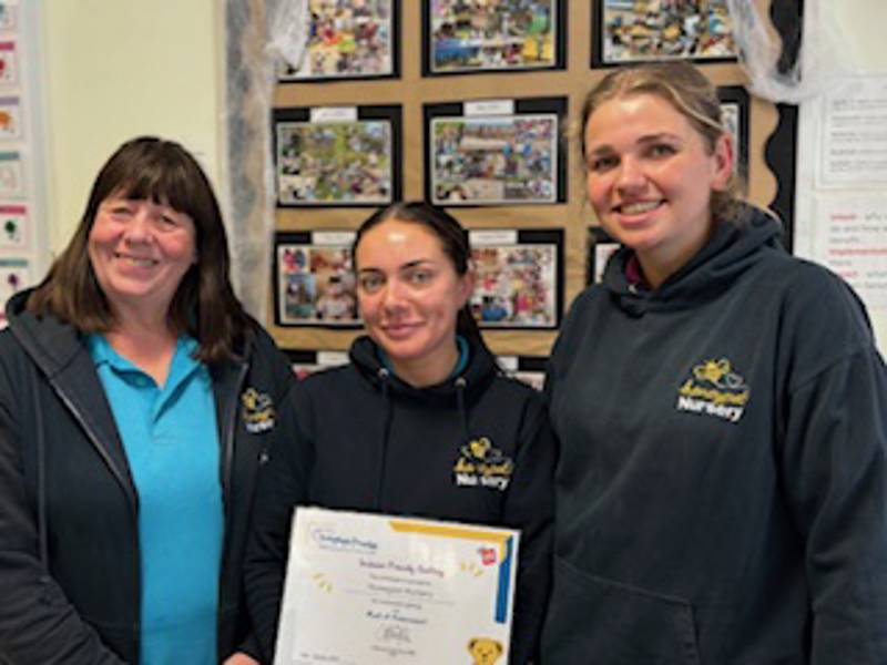 Three members of the Honeypot team with their certificate.