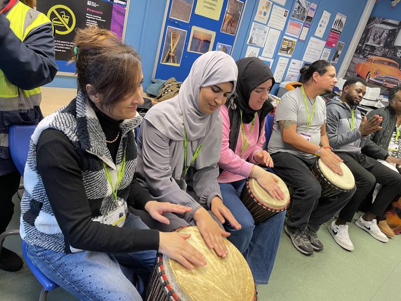 ESOL students enjoying the drumming session