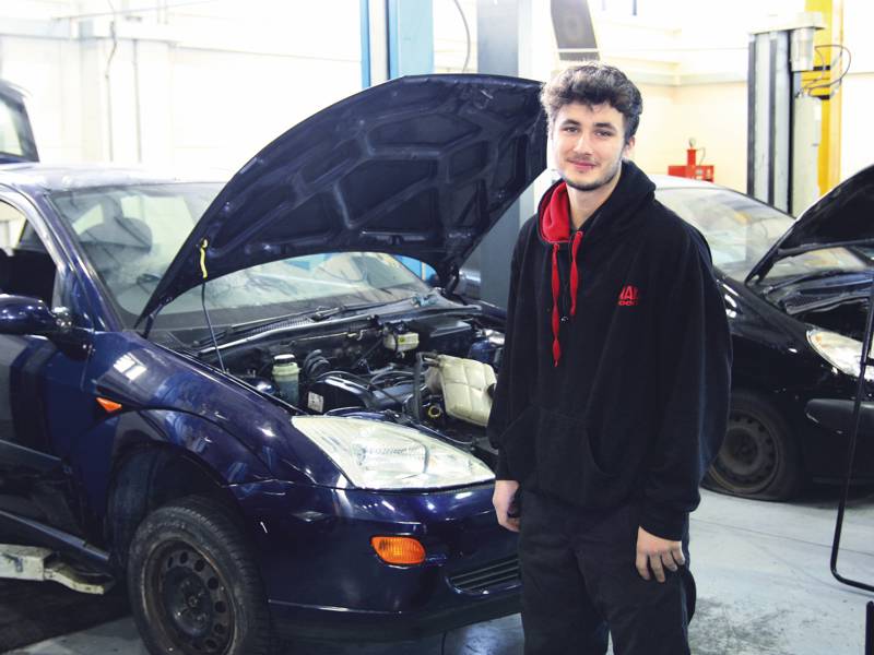 An Automotive Apprentice in the workshop at City of Portsmouth College