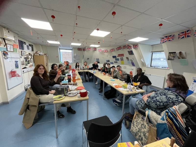 ESOL students seen celebrating Chinese new year.