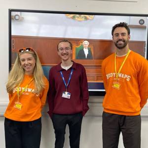 Janie Gonsalez and Paddy Ferguson from Bodyswaps pose with Jack Pauley from City of Portsmouth College
