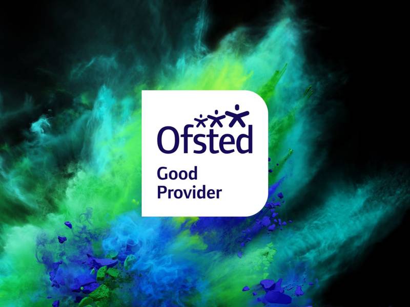 A green and blue burst of coloured powder paint with the Ofsted good provider logo in the centre, awarded to City of Portsmouth College